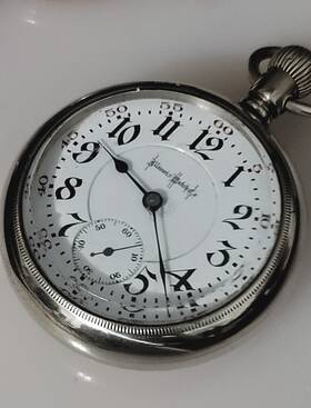 1826584 Illinois Ruby Pocket Watch 17 Jewels Open Face Silver Case White Dial Arabic