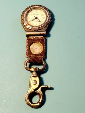 38-219 Remington Vintage Quartz Clip On Pocket Watch Silvertoned Tarnished Not Working