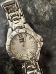 Vintage Tommy Hilfiger 1238 Watch. Fixed Price $20.00.