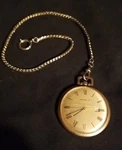 Vintage Caravelle Open Face Pocket Watch With Chain. Fixed Price $110.00.