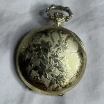 Vintage Sheffield Pocket Watch Gold Tone Embossed Floral Design Hand Wind Works. Fixed Price $64.87.