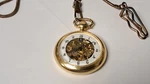 Hong Kong Pocket Watch And Chain Skeleton Yellow 12-24 Hour Dial Louis Xiv. Fixed Price $45.00.