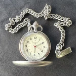 Coleman Silver Full Hunter Pocket Watch Analog White Dial Arabic Numerals Chain. Fixed Price $70.00.