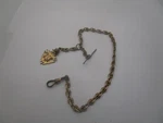 Antique Gold Filled Pocket Watch Chain With Skull & Cross Bones Enameled Fob. Fixed Price $111.88.