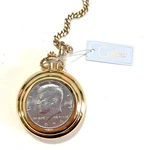 Colibri Goldtone Pocket Watch With Kennedy Half Dollar Double Hunter Case New. Fixed Price $50.00.