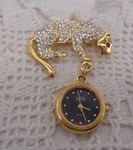 Vintage Quintel Dangle Watch Brooch Rhinestone Panther. Fixed Price $35.00.