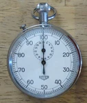 Heuer C. 1950 Stopwatch 100TH Minute Hands, 30 Dial, 2 Button 7 Jewel Timer. Fixed Price $350.00.