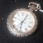 Silver Pocket Watch White Dial Roman Numerals Analog Eiffel Tower Design. Fixed Price $20.00.