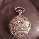 Remington Antimagnetic Full Hunter Pocket Watch Silver Train Motif. Fixed Price $15.00.