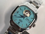 Cushion Automatic Watch Tiffany Blue Open Heart 34MM Steel Swiss Made New. Fixed Price $511.50.