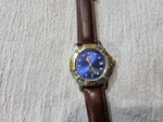 Men's Nike Gold/silver Wrist Watch Blue Face. Fixed Price $38.00.
