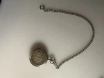 James Michael Silvertone Pocket Watch With Half Dollar Liberty Coin, Working. Fixed Price $100.00.