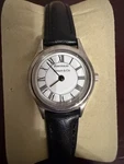 Tiffany & Co. Portfolio 24MM White Dial Ladies Watch + Original Band New. Fixed Price $300.00.