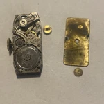 Elbon Watch Co. Movement Jewel Parts/repair 77 Font 52 Runs. Fixed Price $25.00.