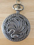 Keychain Pocket Watch With Peacock Design. Fixed Price $30.00.