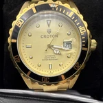 Croton Men's Automatic Diver Gold Dial Stainless Steel Watch 200M Date. Fixed Price $230.00.
