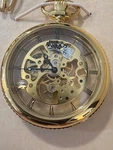 Akribos Xxiv Men Mechanical Stainless Pocket Watch Yellow Gold Plated. Fixed Price $199.99.