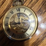 Majestime Mechanical Swiss Made Skeleton Pocket Watch Gold Roman Numerals Chain. Fixed Price $50.00.