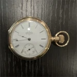Elgin Pocket Watch Mechanical Roman Numerals White Dial, 14 Kyg.. Fixed Price $2500.00.