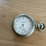 Hampden John C. Railroad Grade Pocket Watch Silver Tone, White Arabic Dial. Fixed Price $200.00.