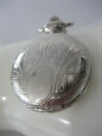 Vintage Calibri Silver Tone Etched Pocket Watch Pendant. Fixed Price $13.48.