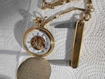 Vintage Colibri Gold Skeleton Mechanical Pocket Watch & Swank Foldin Knife Chain. Fixed Price $59.49.