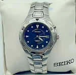 Men Seiko Kinetic Blue Dial Automatic 5M62-0D40 Stainless Watch W/ Box. Fixed Price $150.00.