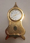 Le Watch Gold Metal Novelty Quartz Clock Analog Display Battery-powered. Fixed Price $10.00.
