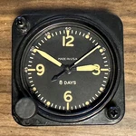 Elgin Grade 690 7 Jewel A-11 2 1/4 Inch Aircraft Clock Fluorescent Yellow Hands. Fixed Price $369.95.