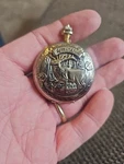 Remington Quartz Pocket Watch Gold Tone Flowered Back Elk Lid 2". Fixed Price $45.99.
